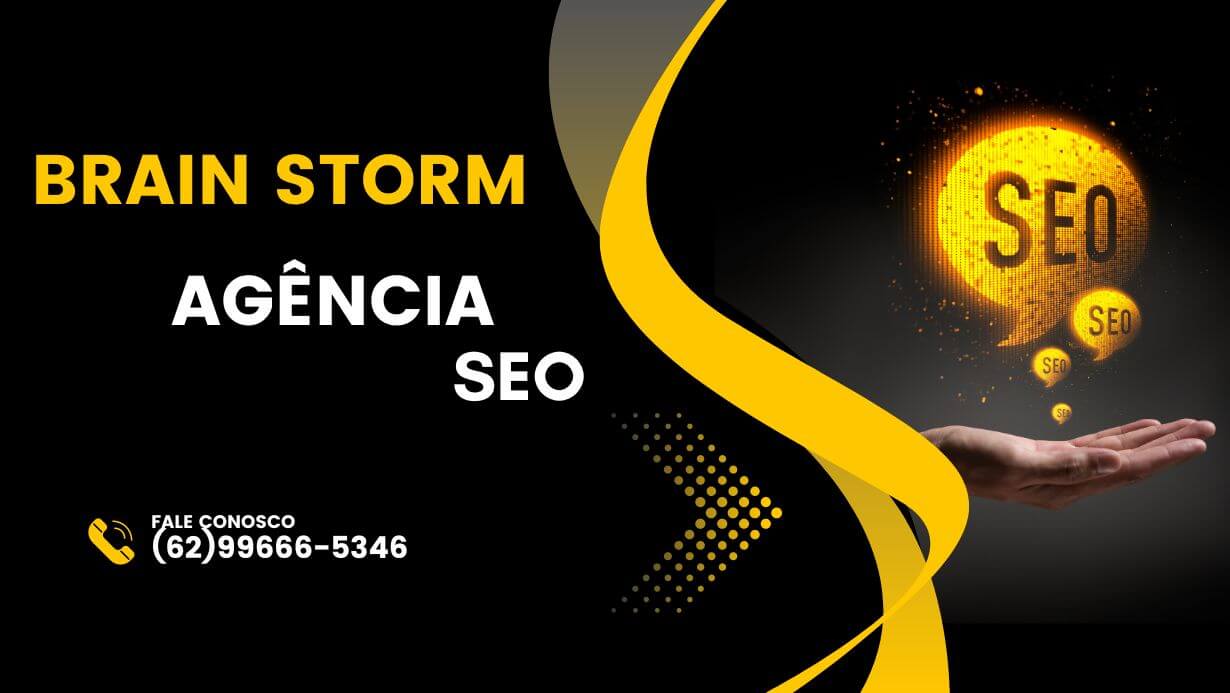 Arte da Brain Storm Agência SEO. Uma mão segura um balão de diálogo amarelo com a sigla SEO em fundo escuro.